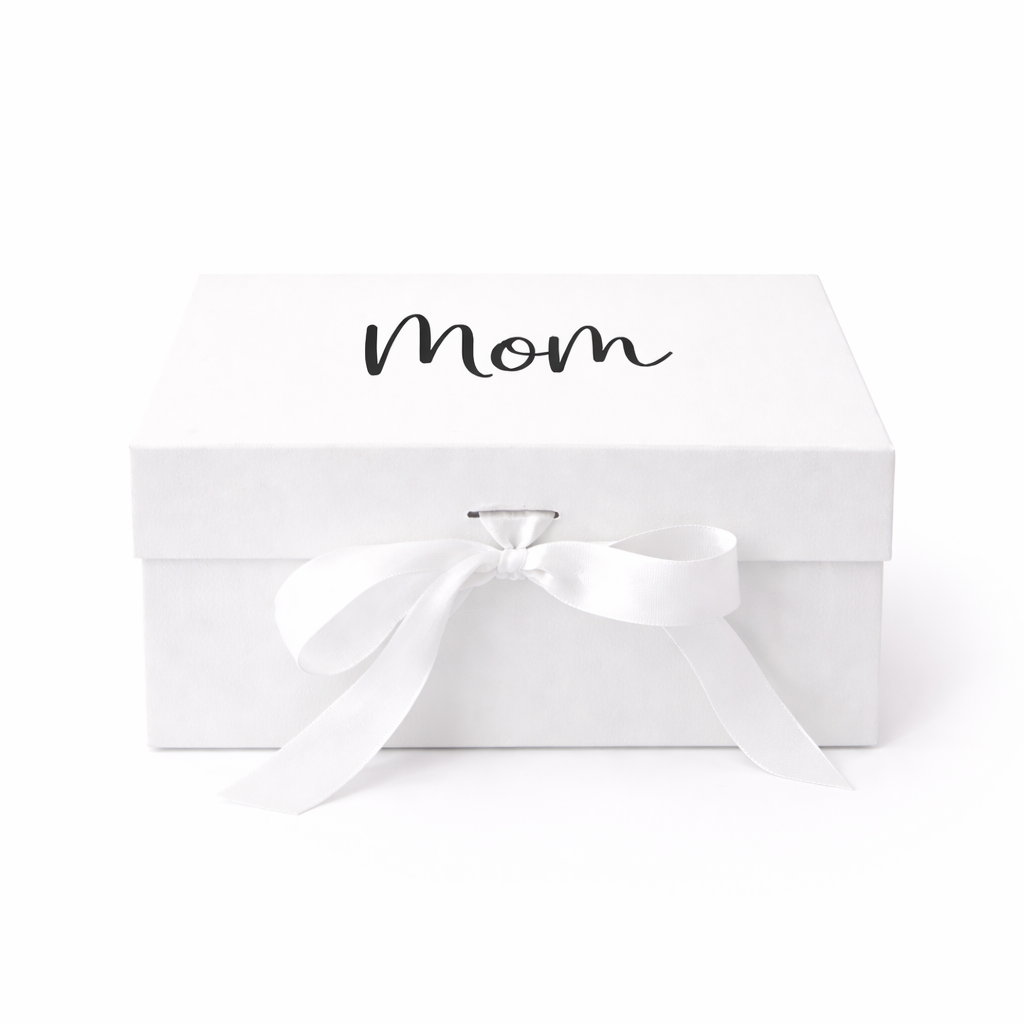 White gift box with a white ribbon and 'Mom' text on a white background
