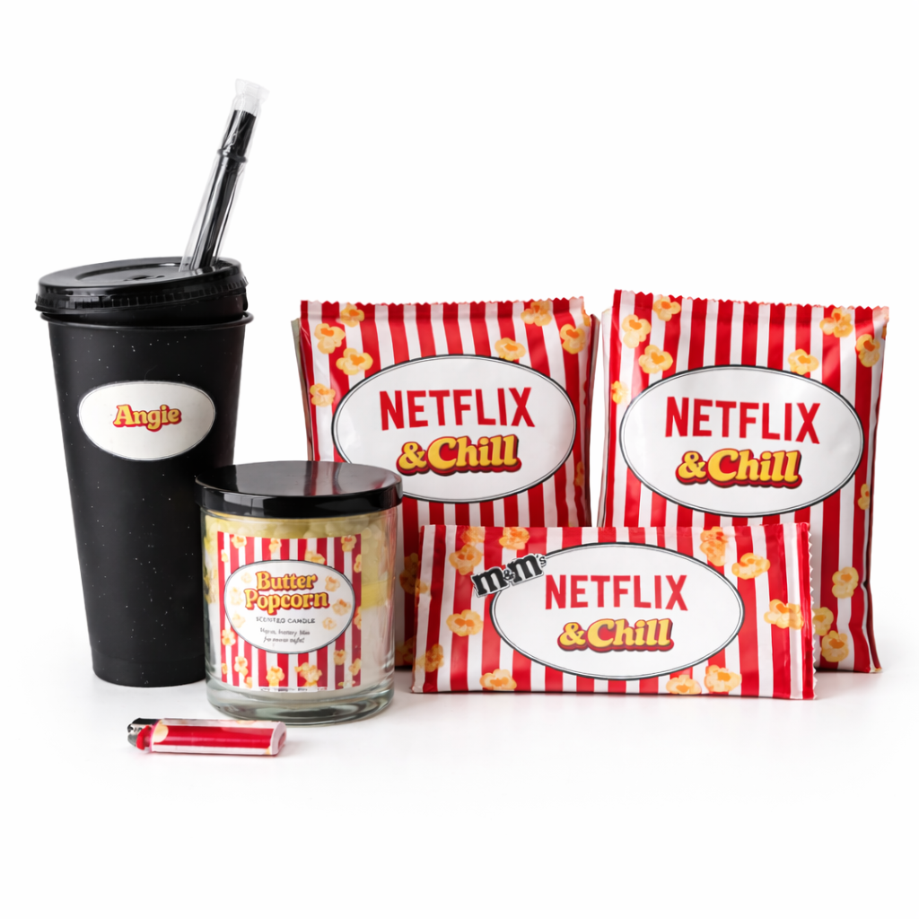 Netflix and Chill-themed popcorn bags, tumbler, and candle on a white background