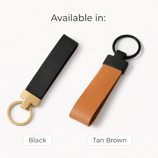 Two leather keychains, one black and one tan brown, on a white background.